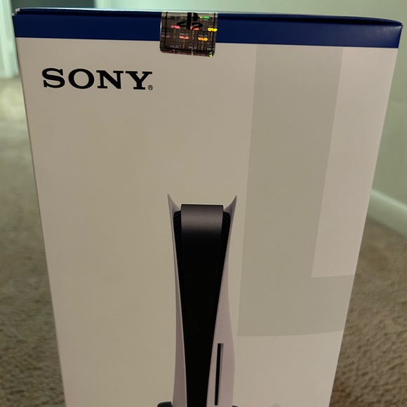 Brand new ps5 with a new controller and three games